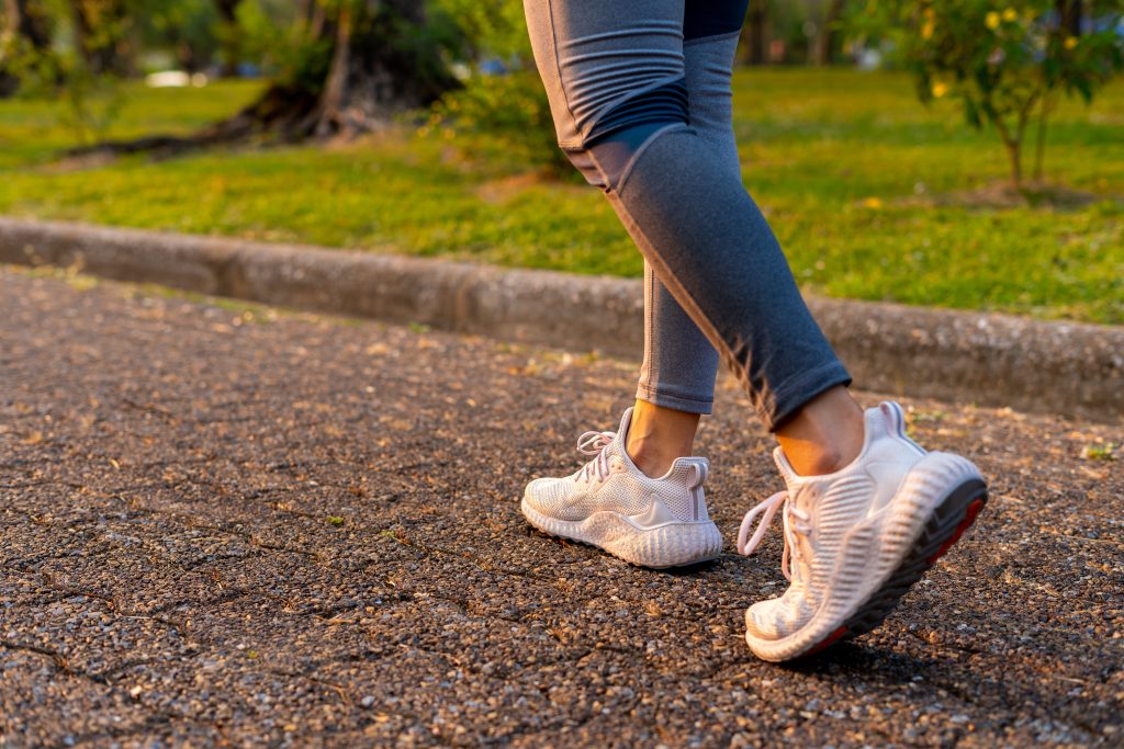photo of a woman's feet outside walking