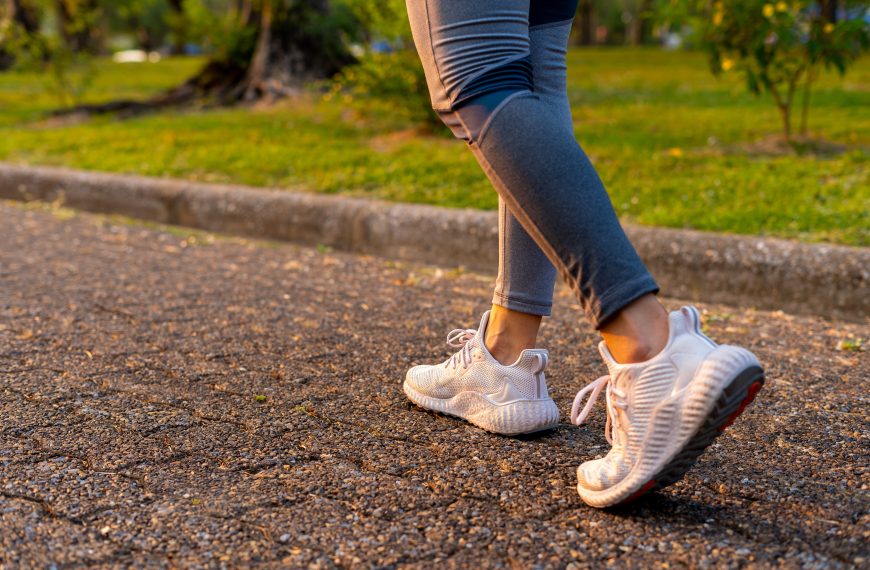 photo of a woman's feet outside walking