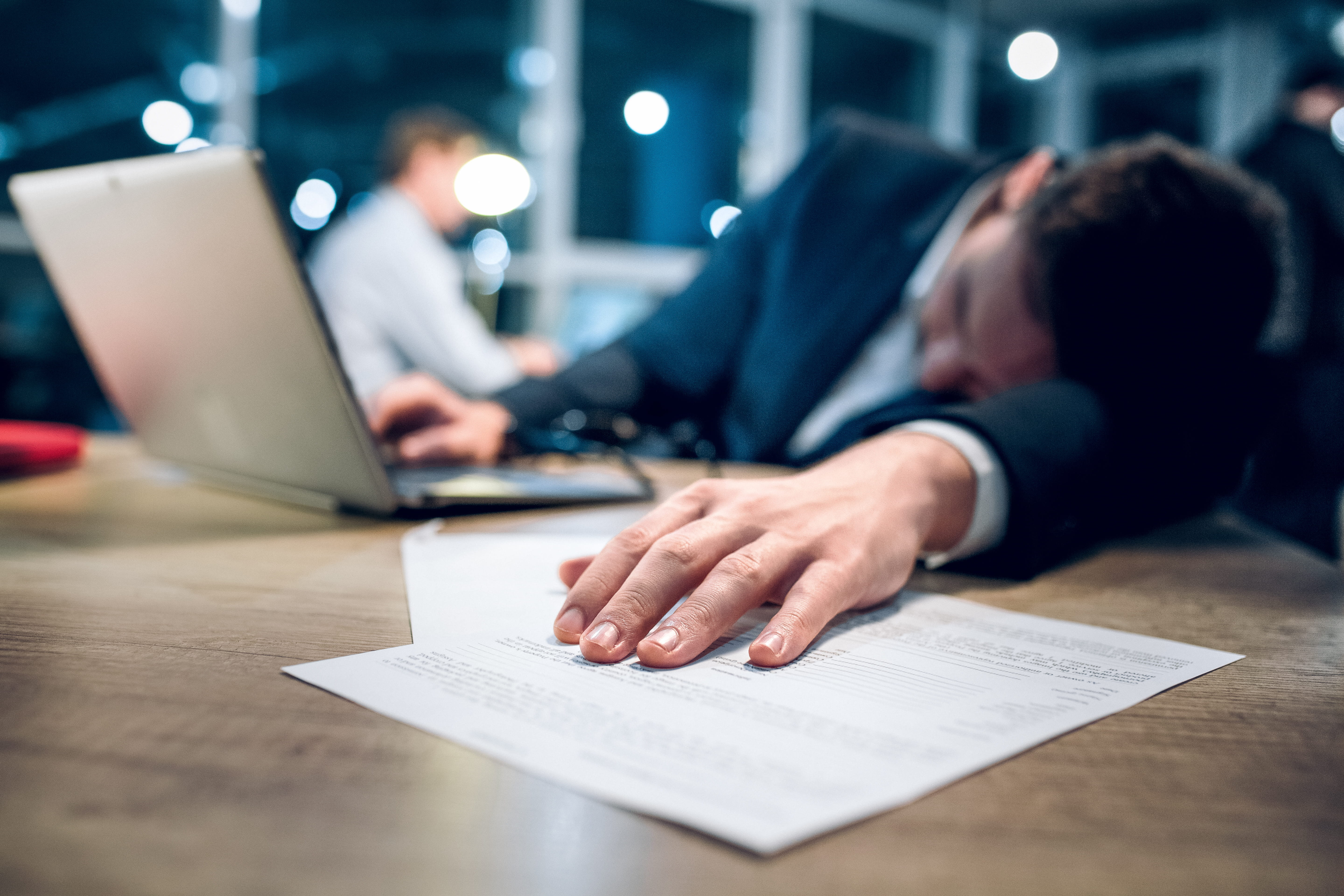 guy sleeping at desk