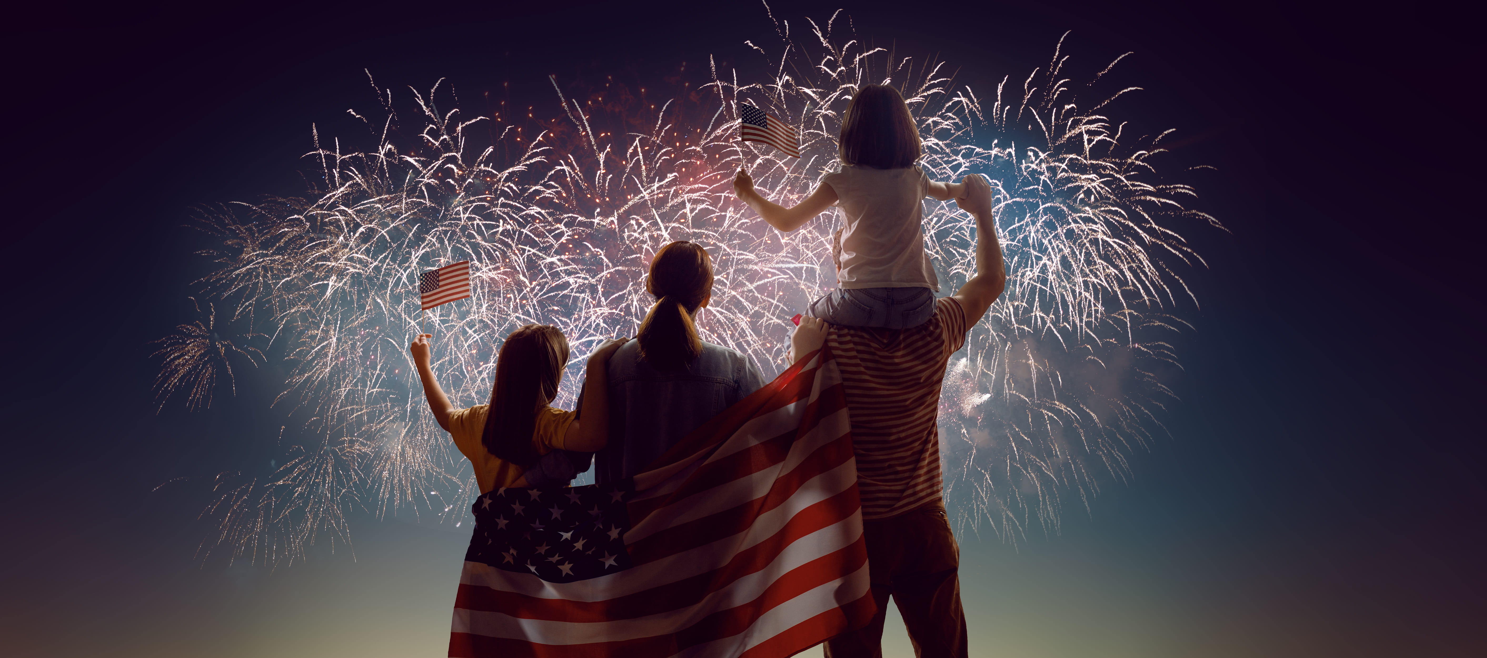 family celebrating July 4th